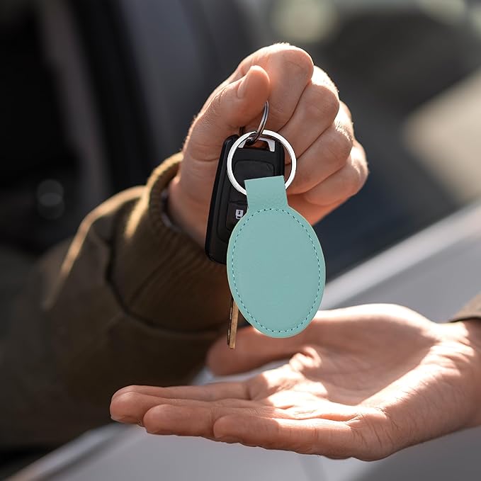 LaserGram Oval Keychain, Golfer Golfing, Personalized Engraving Included (Teal)