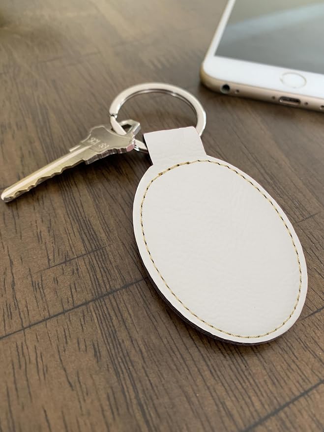 LaserGram Oval Keychain, Golfer Golfing, Personalized Engraving Included (White with Gold)