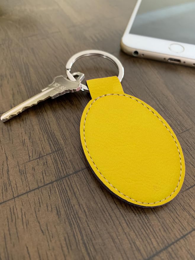LaserGram Oval Keychain, Golfer Golfing, Personalized Engraving Included (Yellow)