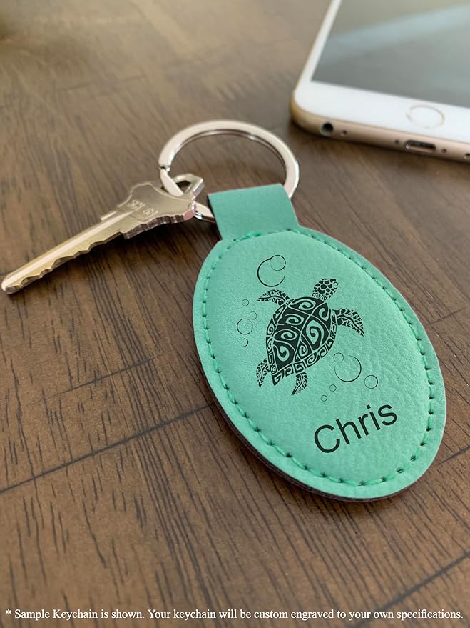 LaserGram Oval Keychain, Golfer Golfing, Personalized Engraving Included (Teal)