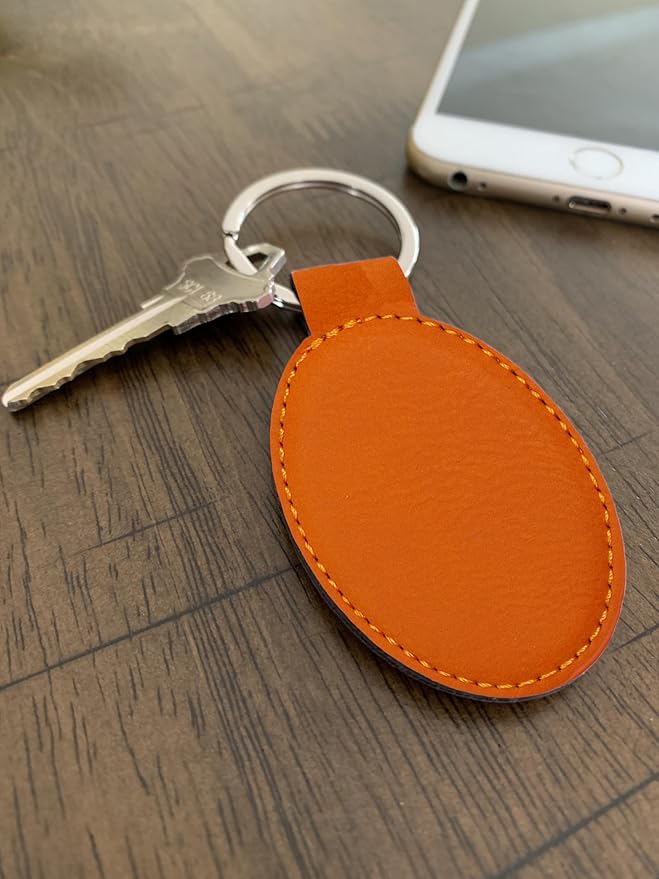 LaserGram Oval Keychain, Golfer Golfing, Personalized Engraving Included (Orange)