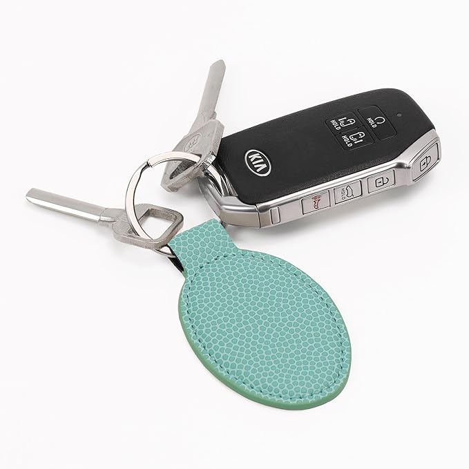 LaserGram Oval Keychain, Golfer Golfing, Personalized Engraving Included (Basketball Teal)