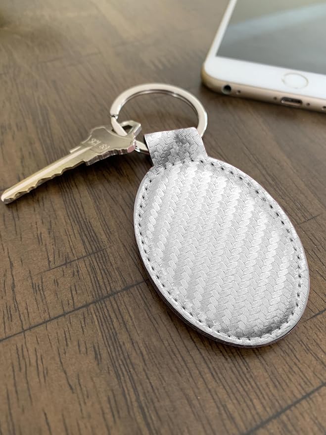 LaserGram Oval Keychain, Golfer Golfing, Personalized Engraving Included (Carbon Fiber Silver)