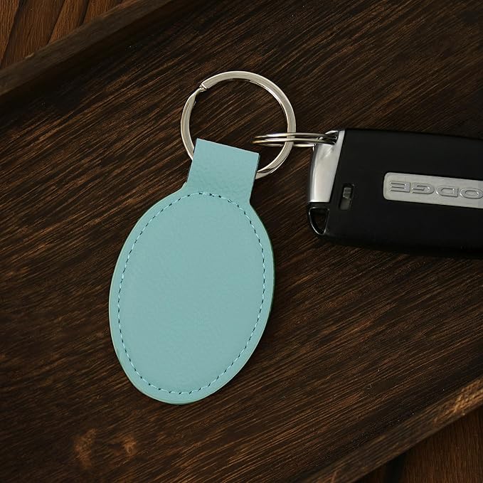LaserGram Oval Keychain, Golfer Golfing, Personalized Engraving Included (Teal)